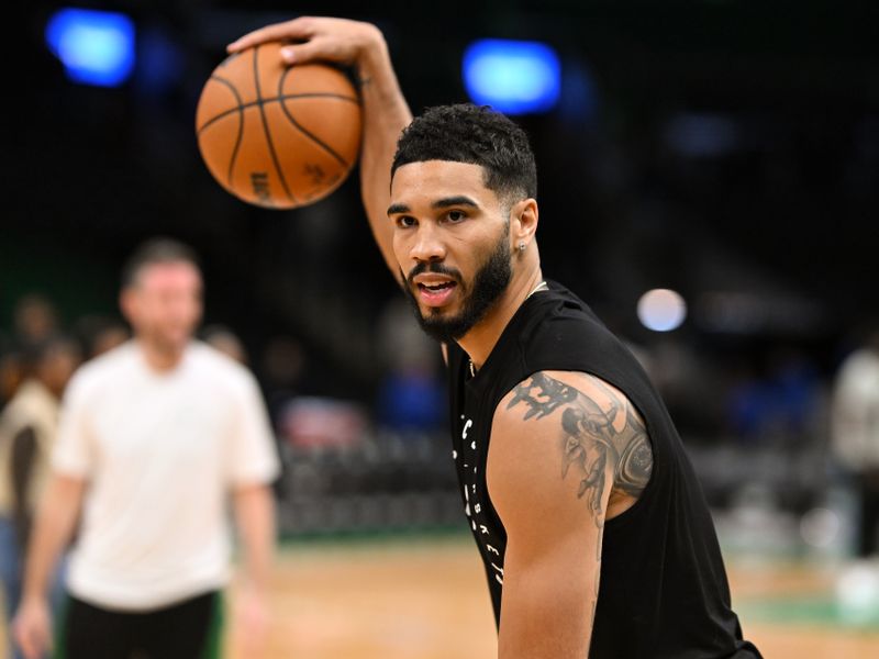 BOSTON, MASSACHUSETTS - OCTOBER 28: Jayson Tatum #0 of the Boston Celtics dribbles the ball before a game against the Milwaukee Bucks at the TD Garden on October 28, 2024 in Boston, Massachusetts. NOTE TO USER: User expressly acknowledges and agrees that, by downloading and or using this photograph, User is consenting to the terms and conditions of the Getty Images License Agreement. (Photo by Brian Fluharty/Getty Images)