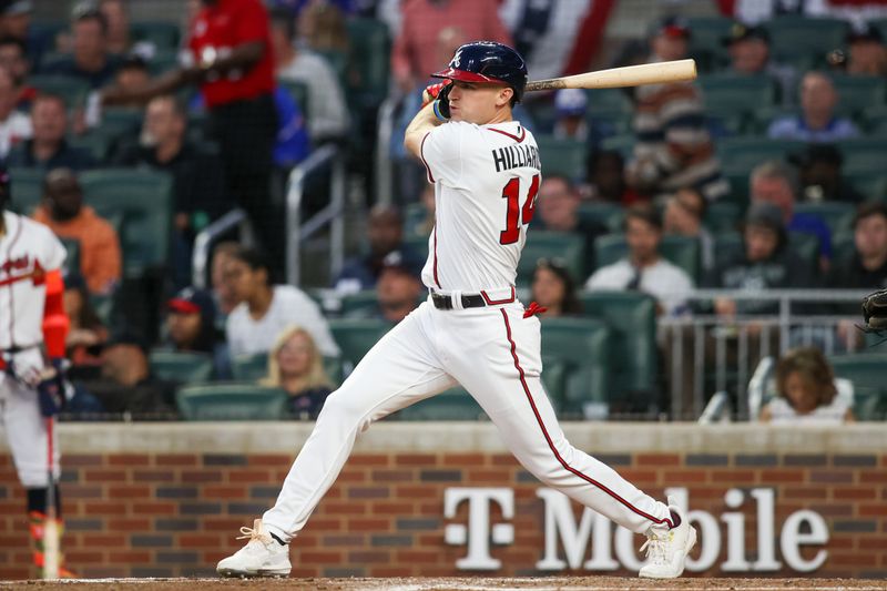 Apr 11, 2023; Atlanta, Georgia, USA; Atlanta Braves center fielder Sam Hilliard (14) hits a double against the Cincinnati Reds in the third inning at Truist Park. Mandatory Credit: Brett Davis-USA TODAY Sports
