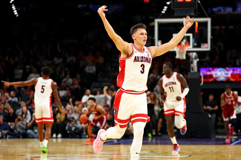 Dec 20, 2023; Phoenix, Arizona, USA; Arizona Wildcats guard Pelle Larsson (3) celebrates after a play during the second half of the game against the Alabama Crimson Tide in the Hall of Fame Series at Footprint Center. Mandatory Credit: Mark J. Rebilas-USA TODAY Sports