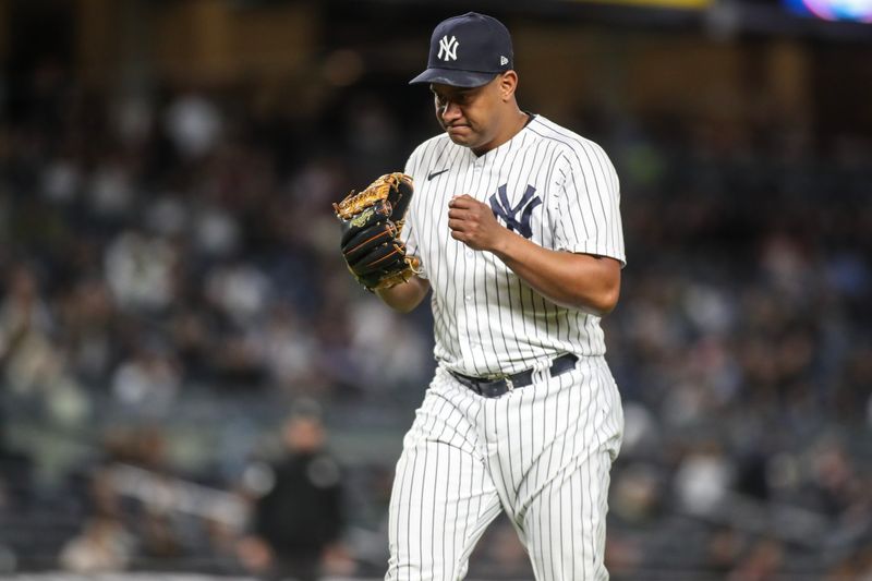 May 2, 2023; Bronx, New York, USA;  New York Yankees relief pitcher Wandy Peralta (58) reacts after retiring the side in the seventh inning against the Cleveland Guardians at Yankee Stadium. Mandatory Credit: Wendell Cruz-USA TODAY Sports