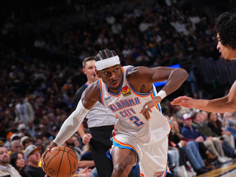 DENVER, CO - NOVEMBER 6: Shai Gilgeous-Alexander #2 of the Oklahoma City Thunder dribbles the ball during the game against the Denver Nuggets during a regular season game on November 6, 2024 at Ball Arena in Denver, Colorado. NOTE TO USER: User expressly acknowledges and agrees that, by downloading and/or using this Photograph, user is consenting to the terms and conditions of the Getty Images License Agreement. Mandatory Copyright Notice: Copyright 2024 NBAE (Photo by Bart Young/NBAE via Getty Images)