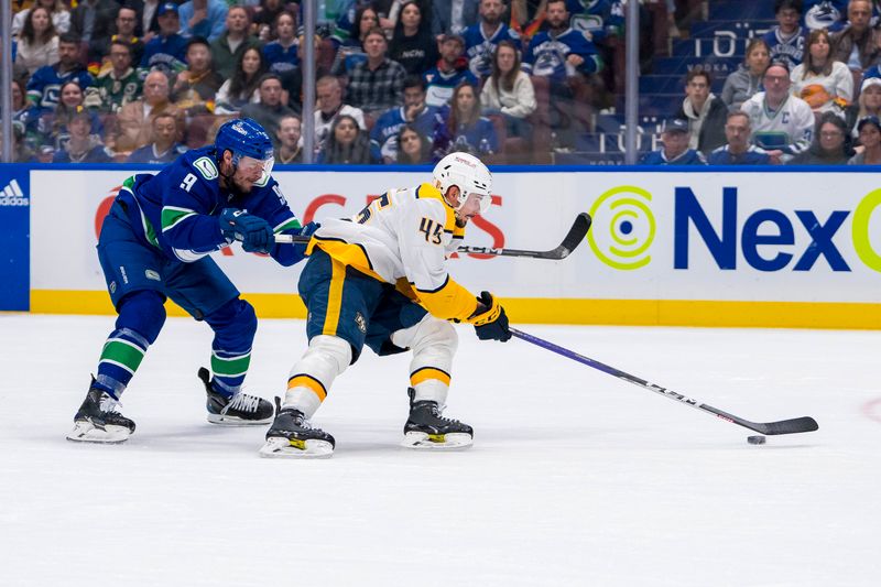 Apr 30, 2024; Vancouver, British Columbia, CAN; Vancouver Canucks forward J.T. Miller (9) stick checks Nashville Predators defenseman Alexandre Carrier (45) during the first period in game five of the first round of the 2024 Stanley Cup Playoffs at Rogers Arena. Mandatory Credit: Bob Frid-USA TODAY Sports