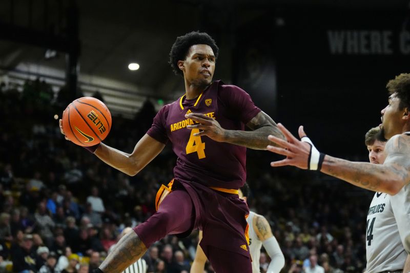 Dec 1, 2022; Boulder, Colorado, USA; Arizona State Sun Devils guard Desmond Cambridge Jr. (4) prepares to pass the ball in the second half against the Colorado Buffaloes at the CU Events Center. Mandatory Credit: Ron Chenoy-USA TODAY Sports