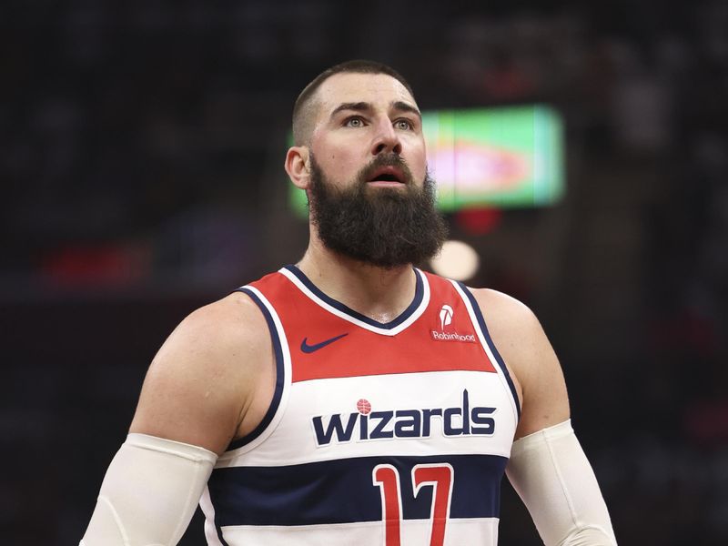 CLEVELAND, OH - DECEMBER 3: Jonas Valanciunas #17 of the Washington Wizards shoots a free throw during the game against the Cleveland Cavaliers in the NBA Cup on December 3, 2024 at Rocket Mortgage FieldHouse in Cleveland, Ohio. NOTE TO USER: User expressly acknowledges and agrees that, by downloading and/or using this Photograph, user is consenting to the terms and conditions of the Getty Images License Agreement. Mandatory Copyright Notice: Copyright 2024 NBAE (Photo by  Lauren Leigh Bacho/NBAE via Getty Images)