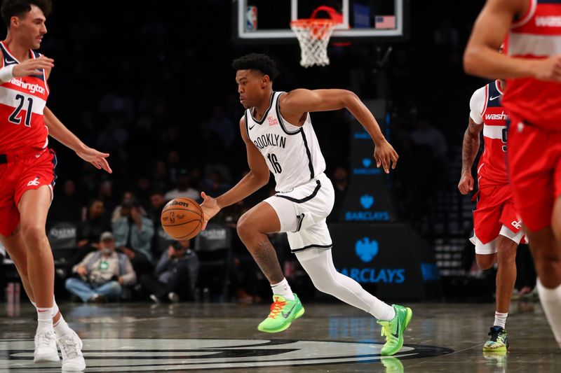 BROOKLYN, NY - OCTOBER 14: Jaylen Martin #16 of the Brooklyn Nets dribbles the ball during the game against the Washington Wizards during a NBA preseason game on October 14, 2024 at Barclays Center in Brooklyn, New York. NOTE TO USER: User expressly acknowledges and agrees that, by downloading and or using this Photograph, user is consenting to the terms and conditions of the Getty Images License Agreement. Mandatory Copyright Notice: Copyright 2024 NBAE (Photo by David L. Nemec/NBAE via Getty Images)