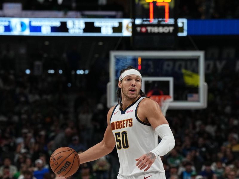 DALLAS, TX - MARCH 17: Aaron Gordon #50 of the Denver Nuggets handles the ball during the game against the Dallas Mavericks on March 17, 2024 at the American Airlines Center in Dallas, Texas. NOTE TO USER: User expressly acknowledges and agrees that, by downloading and or using this photograph, User is consenting to the terms and conditions of the Getty Images License Agreement. Mandatory Copyright Notice: Copyright 2024 NBAE (Photo by Glenn James/NBAE via Getty Images)