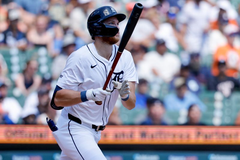 Jul 27, 2025; Detroit, Michigan, USA;  Detroit Tigers outfielder Parker Meadows (22) hits a double in the third inning against the Toronto Blue Jays at Comerica Park. Mandatory Credit: Rick Osentoski-Imagn Images