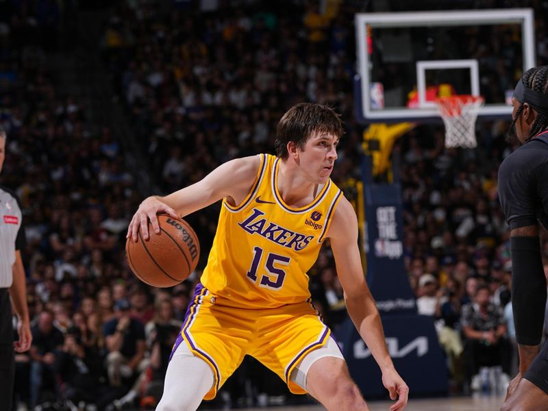 DENVER, CO - APRIL 22: Austin Reaves #15 of the Los Angeles Lakers handles the ball during the game against the Denver Nuggets on April 22, 2024 at the Ball Arena in Denver, Colorado. NOTE TO USER: User expressly acknowledges and agrees that, by downloading and/or using this Photograph, user is consenting to the terms and conditions of the Getty Images License Agreement. Mandatory Copyright Notice: Copyright 2024 NBAE (Photo by Bart Young/NBAE via Getty Images)