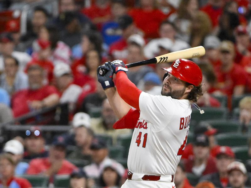 May 6, 2025; St. Louis, Missouri, USA;  St. Louis Cardinals first baseman Alec Burleson (41) hits a two run double against the Pittsburgh Pirates during the sixth inning at Busch Stadium. Mandatory Credit: Jeff Curry-Imagn Images