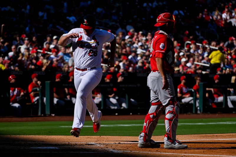 Oct 1, 2023; St. Louis, Missouri, USA;  St. Louis Cardinals first baseman Luken Baker (26) scores against the Cincinnati Reds during the third inning at Busch Stadium. Mandatory Credit: Jeff Curry-USA TODAY Sports