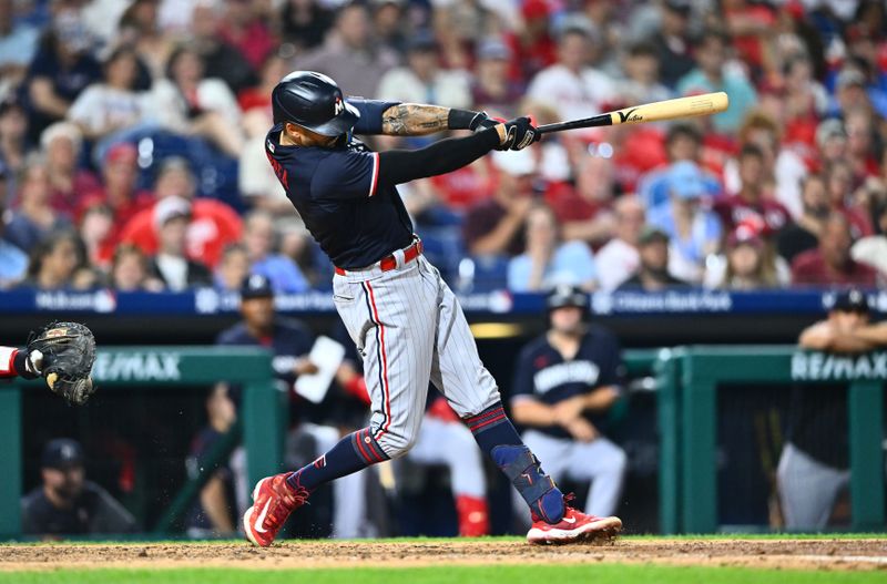 Aug 12, 2023; Philadelphia, Pennsylvania, USA; Minnesota Twins shortstop Carlos Correa (4) hits a home run against the Philadelphia Phillies in the seventh inning at Citizens Bank Park. Mandatory Credit: Kyle Ross-USA TODAY Sports