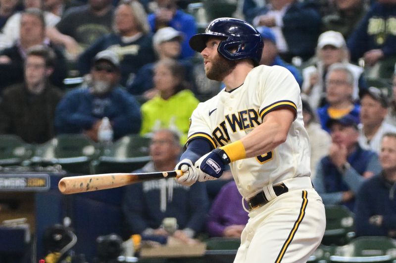 May 24, 2023; Milwaukee, Wisconsin, USA; Milwaukee Brewers third baseman Owen Miller (6) watches after hitting a solo home run against the Houston Astros in the seventh inning at American Family Field. Mandatory Credit: Benny Sieu-USA TODAY Sports