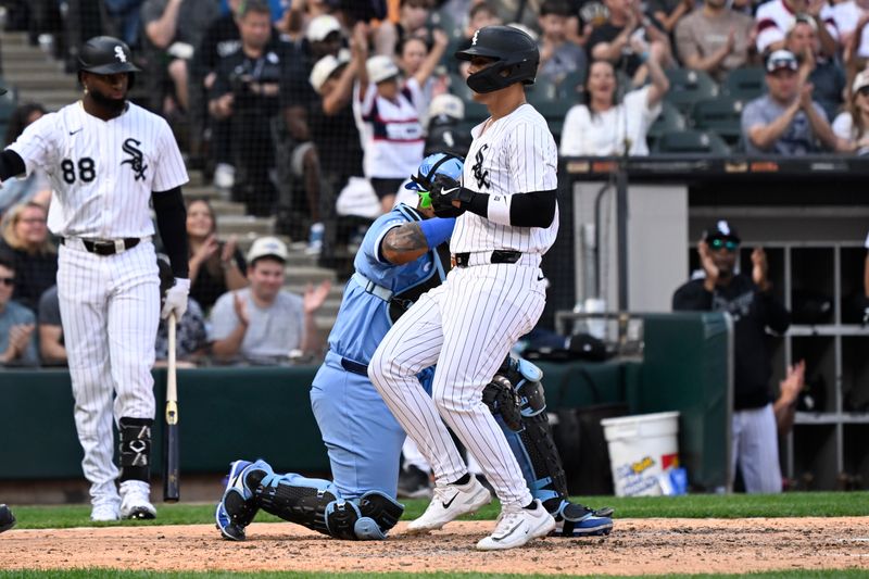 Jun 7, 2025; Chicago, Illinois, USA;  Chicago White Sox third baseman Miguel Vargas (20) scores during the eighth inning against the Kansas City Royals at Rate Field. Mandatory Credit: Matt Marton-Imagn Images