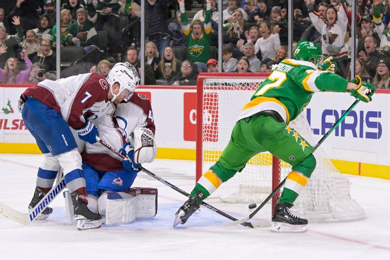 Nov 24, 2023; Saint Paul, Minnesota, USA; Minnesota Wild forward Kirill Kaprizov (97) scores a goal as Colorado Avalanche defenseman Devon Toews (7) collides with goalie Alexandar Georgiev (40) during the second period at Xcel Energy Center. Mandatory Credit: Nick Wosika-USA TODAY Sports