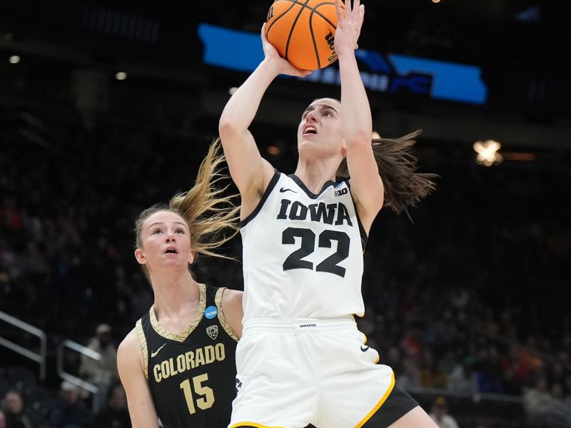 Mar 24, 2023; Seattle, WA, USA; Iowa Hawkeyes guard Caitlin Clark (22) shoots the ball against Colorado Buffaloes guard Kindyll Wetta (15) in the first half at Climate Pledge Arena. Mandatory Credit: Kirby Lee-USA TODAY Sports