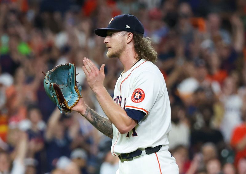 Jul 11, 2024; Houston, Texas, USA; Houston Astros relief pitcher Josh Hader (71) celebrates the win against the Miami Marlins in at Minute Maid Park. Mandatory Credit: Thomas Shea-USA TODAY Sports