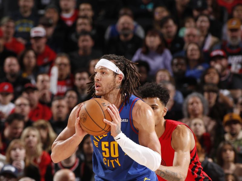 PORTLAND, OR - MARCH 23: Aaron Gordon #50 of the Denver Nuggets drives to the basket during the game against the Portland Trail Blazers on March 23, 2024 at the Moda Center Arena in Portland, Oregon. NOTE TO USER: User expressly acknowledges and agrees that, by downloading and or using this photograph, user is consenting to the terms and conditions of the Getty Images License Agreement. Mandatory Copyright Notice: Copyright 2024 NBAE (Photo by Cameron Browne/NBAE via Getty Images)