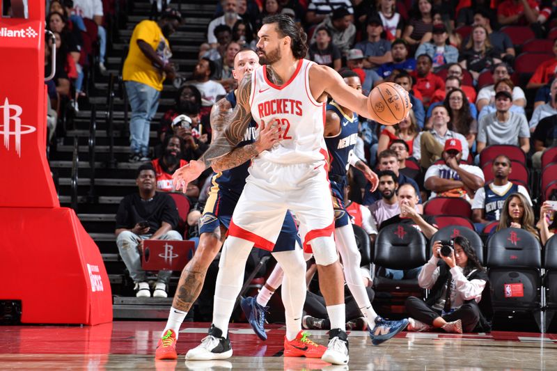 HOUSTON, TX - OCTOBER 15: Steven Adams #12 of the Houston Rockets handles the ball during the game against the New Orleans Pelicans during a NBA preseason game on October 15, 2024 at the Toyota Center in Houston, Texas. NOTE TO USER: User expressly acknowledges and agrees that, by downloading and or using this photograph, User is consenting to the terms and conditions of the Getty Images License Agreement. Mandatory Copyright Notice: Copyright 2024 NBAE (Photo by Logan Riely/NBAE via Getty Images)