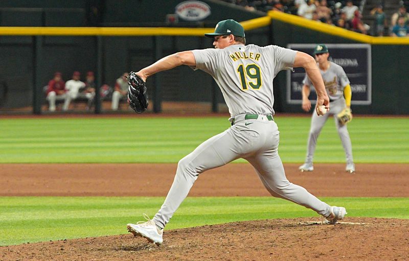 Jun 28, 2024; Phoenix, Arizona, USA; Oakland Athletics pitcher Mason Miller (19) throws in the ninth inning against Arizona Diamondbacks at Chase Field. Mandatory Credit: Allan Henry-USA TODAY Sports