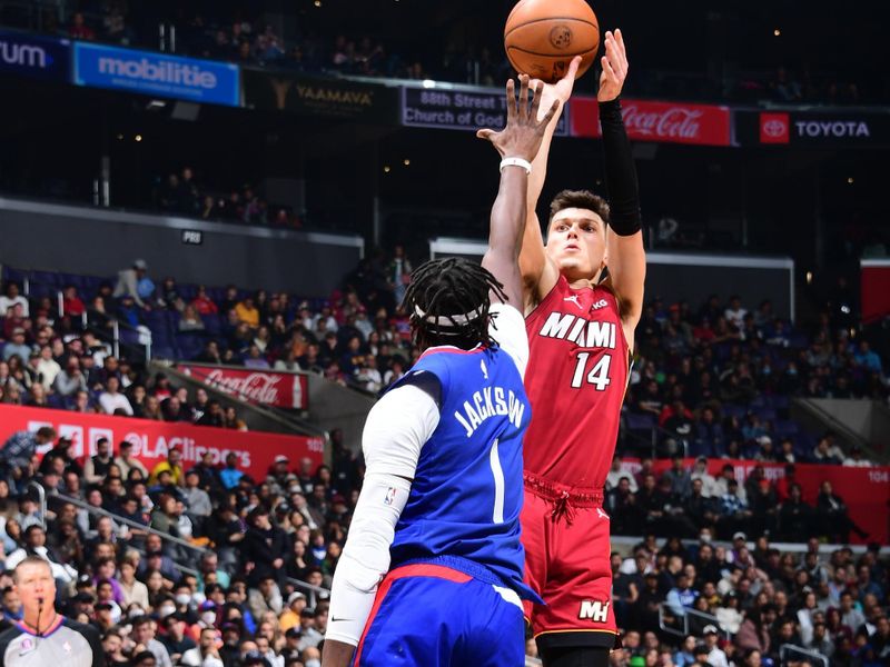 LOS ANGELES, CA - JANUARY 2: Tyler Herro #14 of the Miami Heat shoots the ball during the game against the LA Clippers on January 2, 2023 at Crypto.Com Arena in Los Angeles, California. NOTE TO USER: User expressly acknowledges and agrees that, by downloading and/or using this Photograph, user is consenting to the terms and conditions of the Getty Images License Agreement. Mandatory Copyright Notice: Copyright 2023 NBAE (Photo by Adam Pantozzi/NBAE via Getty Images)