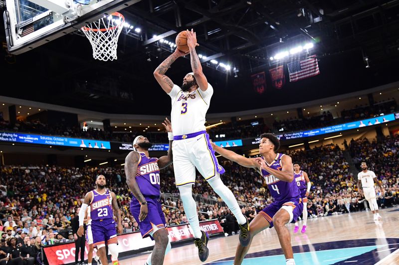 LOS ANGELES, CA - OCTOBER 6: Anthony Davis #3 of the Los Angeles Lakers drives to the basket during the game against the Phoenix Suns on October 6, 2024 at Acrisure Arena in Palm Springs, California. NOTE TO USER: User expressly acknowledges and agrees that, by downloading and/or using this Photograph, user is consenting to the terms and conditions of the Getty Images License Agreement. Mandatory Copyright Notice: Copyright 2024 NBAE (Photo by Adam Pantozzi/NBAE via Getty Images)