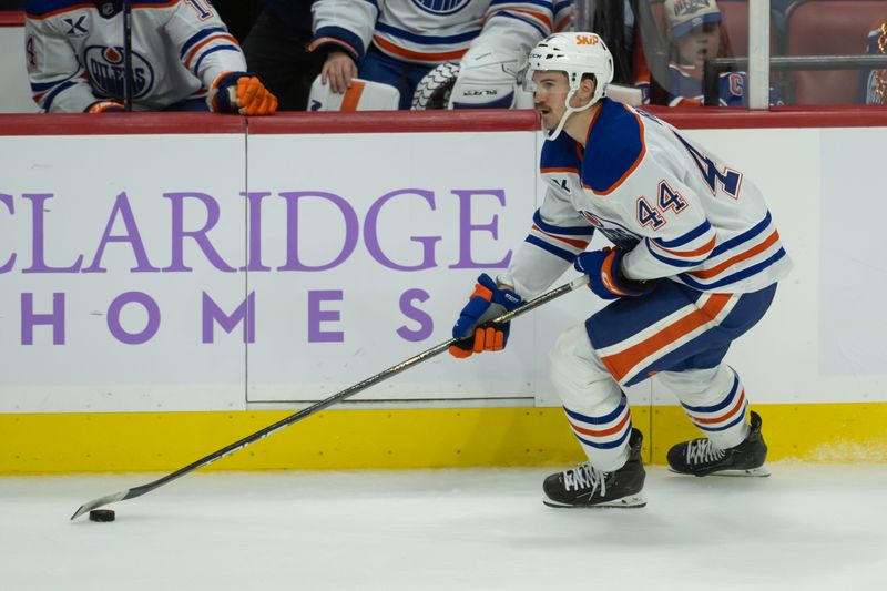 Nov 19, 2024; Ottawa, Ontario, CAN; Edmonton Oilers defenseman Joshua Brown (44) skates with the puck in the third period against the Ottawa Senators at the Canadian Tire Centre. Mandatory Credit: Marc DesRosiers-Imagn Images