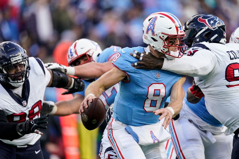 Houston Texans defensive tackle Maliek Collins (96) sacks Tennessee Titans quarterback Will Levis (8) during the second half of an NFL football game, Sunday, Dec. 17, 2023, in Nashville, Tenn. (AP Photo/George Walker IV)