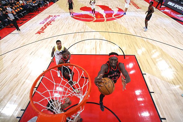 TORONTO, CANADA - DECEMBER 23:  Pascal Siakam #43 of the Toronto Raptors grabs a rebound during the game against the Utah Jazz on December 23, 2023 at the Scotiabank Arena in Toronto, Ontario, Canada.  NOTE TO USER: User expressly acknowledges and agrees that, by downloading and or using this Photograph, user is consenting to the terms and conditions of the Getty Images License Agreement.  Mandatory Copyright Notice: Copyright 2023 NBAE (Photo by Vaughn Ridley/NBAE via Getty Images)