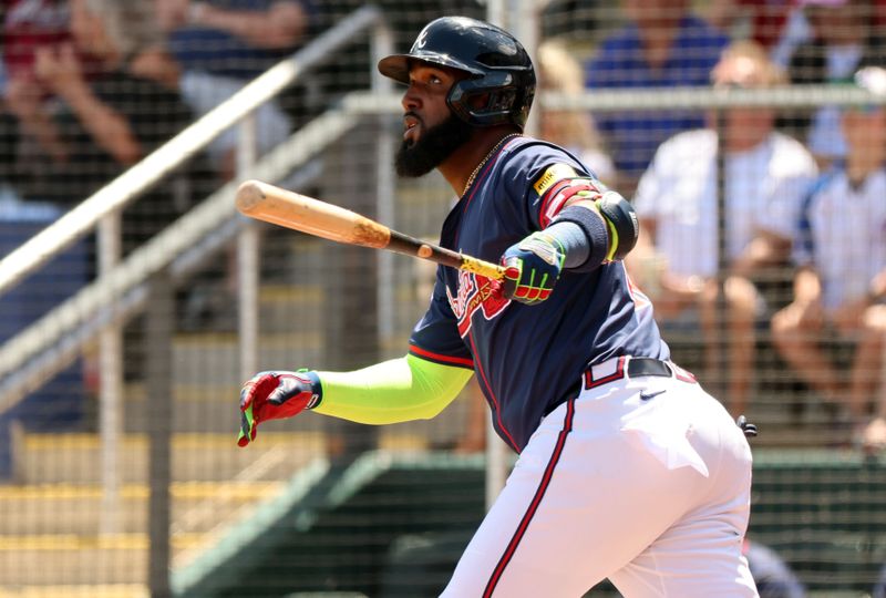 Mar 25, 2024; North Port, Florida, USA; Atlanta Braves designated hitter Marcell Ozuna (20) hits a 3-run home run during the first inning against the Minnesota Twins at CoolToday Park. Mandatory Credit: Kim Klement Neitzel-USA TODAY Sports