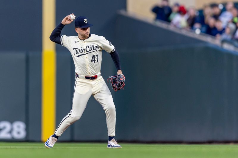 Apr 9, 2024; Minneapolis, Minnesota, USA; Minnesota Twins second baseman Edouard Julien (47) throws the ball to first base for an out against the Los Angeles Dodgers in the fifth inning at Target Field. Mandatory Credit: Jesse Johnson-USA TODAY Sports