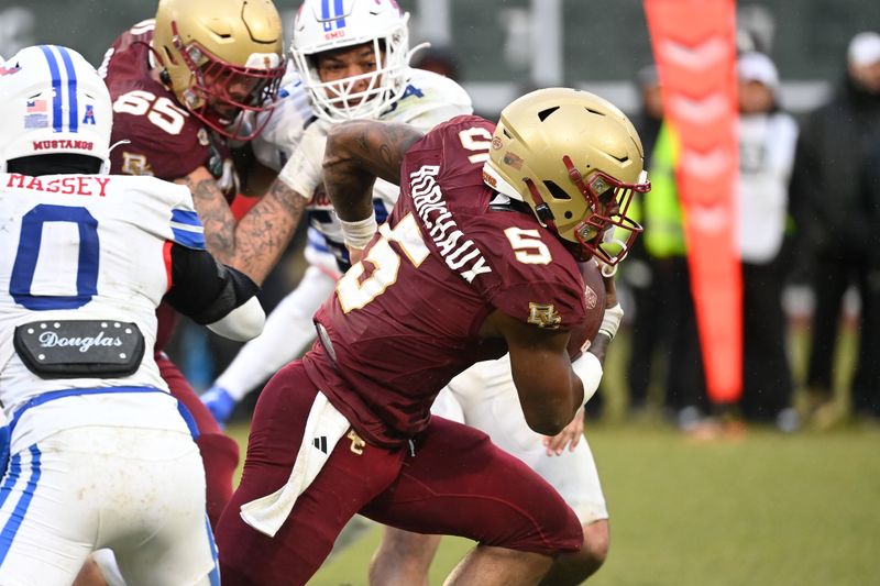 Dec 28, 2023; Boston, MA, USA; Boston College Eagles running back Kye Robichaux (5) breaks through tackles and runs the ball during the second half against the Southern Methodist Mustangs at Fenway Park. Mandatory Credit: Eric Canha-USA TODAY Sports