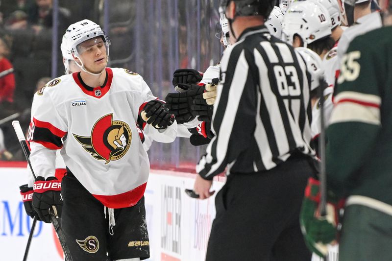 Dec 13, 2025; Saint Paul, Minnesota, USA;  Ottawa Senators forward Tim Stutzle (18) celebrates his power play goal against the Minnesota Wild during the second period at Grand Casino Arena. Mandatory Credit: Nick Wosika-Imagn Images
