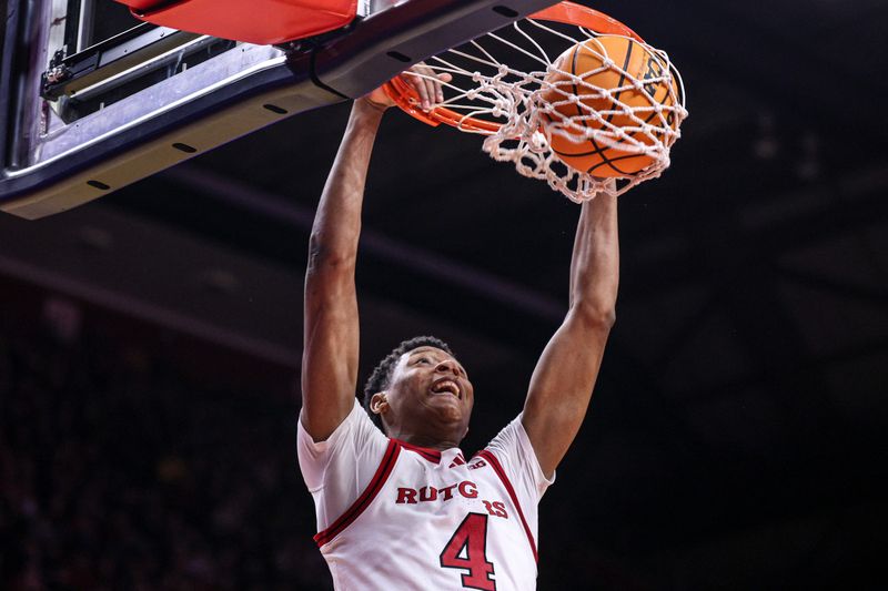 Feb 1, 2025; Piscataway, New Jersey, USA; Rutgers Scarlet Knights guard Ace Bailey (4) dunks the ball during the second half against the Michigan Wolverines at Jersey Mike's Arena. Mandatory Credit: Vincent Carchietta-Imagn Images