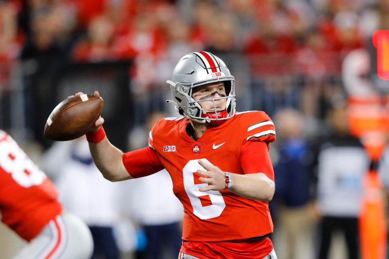 Sep 25, 2021; Columbus, Ohio, USA; Ohio State Buckeyes quarterback Kyle McCord (6) drops to throw during the first quarter against the Akron Zips at Ohio Stadium. Mandatory Credit: Joseph Maiorana-USA TODAY Sports