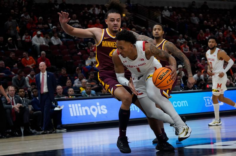 Mar 9, 2023; Chicago, IL, USA; Minnesota Golden Gophers guard Braeden Carrington (4) defends Maryland Terrapins guard Jahmir Young (1) during the second half at United Center. Mandatory Credit: David Banks-USA TODAY Sports