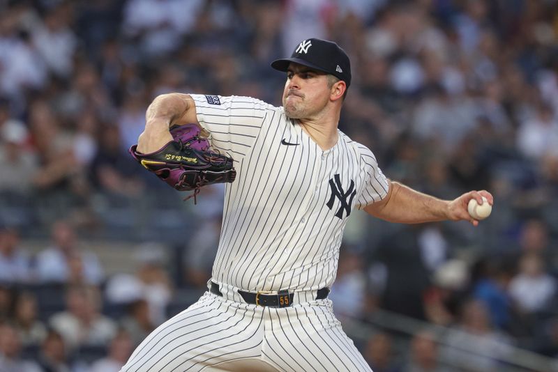 Jun 5, 2024; Bronx, New York, USA; New York Yankees starting pitcher Carlos Rodon (55) delivers a pitch during the fourth inning against the Minnesota Twins at Yankee Stadium. Mandatory Credit: Vincent Carchietta-USA TODAY Sports