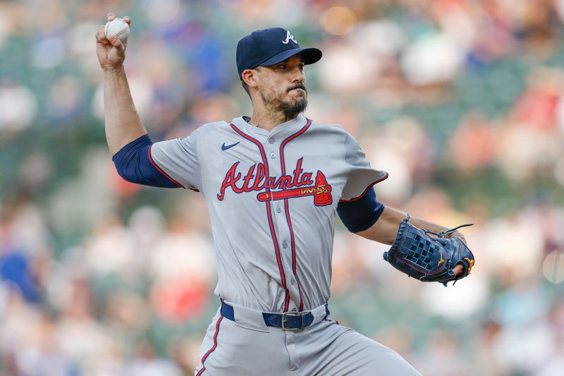 May 21, 2024; Chicago, Illinois, USA; Atlanta Braves starting pitcher Charlie Morton (50) delivers a pitch against the Chicago Cubs during the first inning at Wrigley Field. Mandatory Credit: Kamil Krzaczynski-USA TODAY Sports