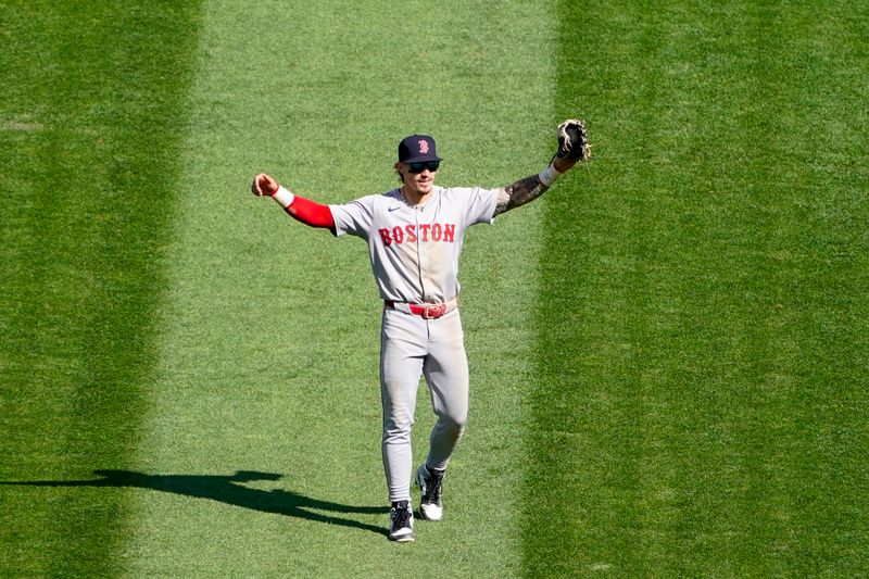 Jun 9, 2024; Chicago, Illinois, USA; Boston Red Sox outfielder Ceddanne Rafaela (43) celebrates the win against the Chicago White Sox at Guaranteed Rate Field. Mandatory Credit: David Banks-USA TODAY Sports