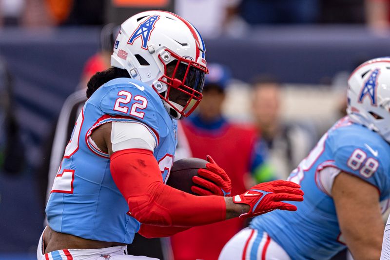 Tennessee Titans running back Derrick Henry (22) runs for yardage during their NFL football game against the Houston Texans Sunday, Dec. 17, 2023, in Nashville, Tenn. (AP Photo/Wade Payne)