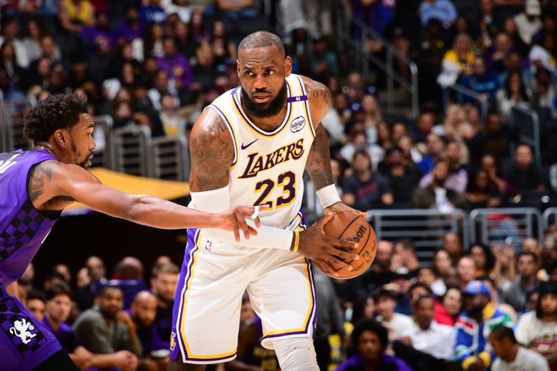 LOS ANGELES, CA - OCTOBER 26: LeBron James #23 of the Los Angeles Lakers handles the ball during the game against the Sacramento Kings on October 26, 2024 at Crypto.Com Arena in Los Angeles, California. NOTE TO USER: User expressly acknowledges and agrees that, by downloading and/or using this Photograph, user is consenting to the terms and conditions of the Getty Images License Agreement. Mandatory Copyright Notice: Copyright 2024 NBAE (Photo by Adam Pantozzi/NBAE via Getty Images)