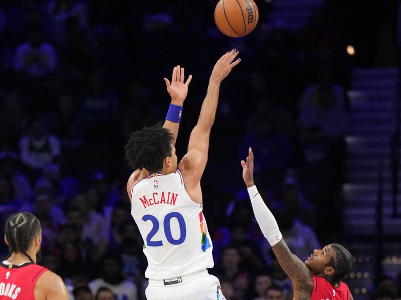 PHILADELPHIA, PA - NOVEMBER 27: Jared McCain #20 of the Philadelphia 76ers shoots the ball during the game against the Houston Rockets on November 27, 2024 at the Wells Fargo Center in Philadelphia, Pennsylvania NOTE TO USER: User expressly acknowledges and agrees that, by downloading and/or using this Photograph, user is consenting to the terms and conditions of the Getty Images License Agreement. Mandatory Copyright Notice: Copyright 2024 NBAE (Photo by Jesse D. Garrabrant/NBAE via Getty Images)