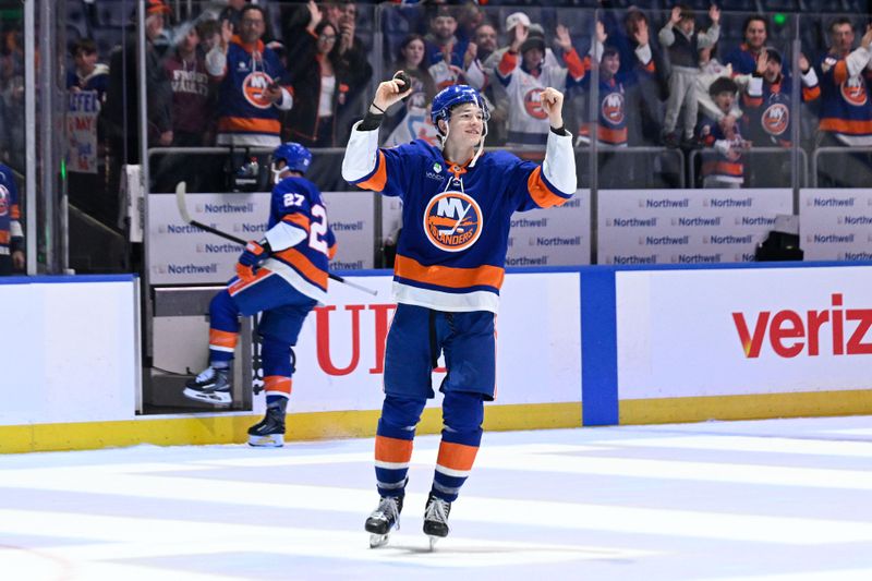 Mar 1, 2026; Elmont, New York, USA; New York Islanders defenseman Matthew Schaefer (48) celebrates with the crowd after the victory over the Florida Panthers during the third period at UBS Arena. Mandatory Credit: Dennis Schneidler-Imagn Images