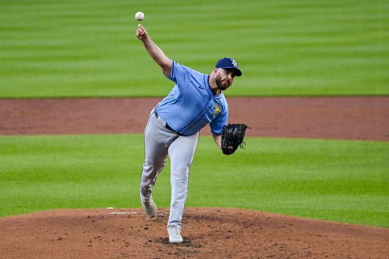 May 31, 2024; Baltimore, Maryland, USA;  Tampa Bay Rays pitcher Aaron Civale (34) delivers a first inning pitch against the Baltimore Orioles at Oriole Park at Camden Yards. Mandatory Credit: Tommy Gilligan-USA TODAY Sports