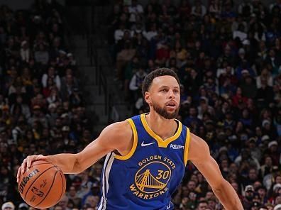 DENVER, CO - DECEMBER 25: Stephen Curry #30 of the Golden State Warriors looks on during the game against the Denver Nuggets on December 25, 2023 at the Ball Arena in Denver, Colorado. NOTE TO USER: User expressly acknowledges and agrees that, by downloading and/or using this Photograph, user is consenting to the terms and conditions of the Getty Images License Agreement. Mandatory Copyright Notice: Copyright 2023 NBAE (Photo by Bart Young/NBAE via Getty Images)