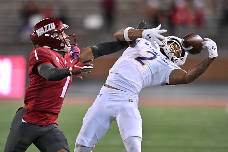 Sep 20, 2024; Pullman, Washington, USA; San Jose State Spartans wide receiver TreyShun Hurry (2) makes a catch against Washington State Cougars defensive back Stephen Hall (1) in the second at Gesa Field at Martin Stadium. Washington State Cougars won 54-52 in double overtime. Mandatory Credit: James Snook-Imagn Images