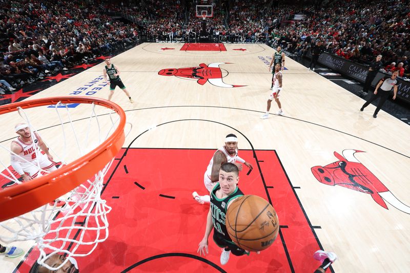 CHICAGO, IL - MARCH 23: Payton Pritchard #11 of the Boston Celtics drives to the basket during the game against the Chicago Bulls on March 23, 2024 at United Center in Chicago, Illinois. NOTE TO USER: User expressly acknowledges and agrees that, by downloading and or using this photograph, User is consenting to the terms and conditions of the Getty Images License Agreement. Mandatory Copyright Notice: Copyright 2024 NBAE (Photo by Jeff Haynes/NBAE via Getty Images)