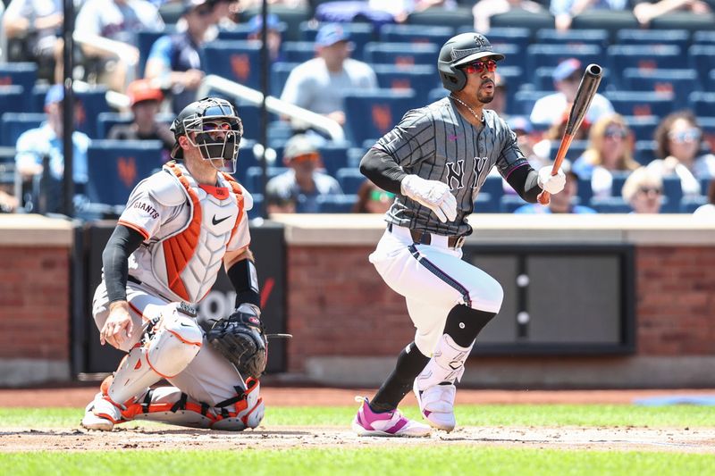 May 25, 2024; New York City, New York, USA;  New York Mets shortstop Francisco Lindor (12) hits a double in the first inning against the San Francisco Giants at Citi Field. Mandatory Credit: Wendell Cruz-USA TODAY Sports