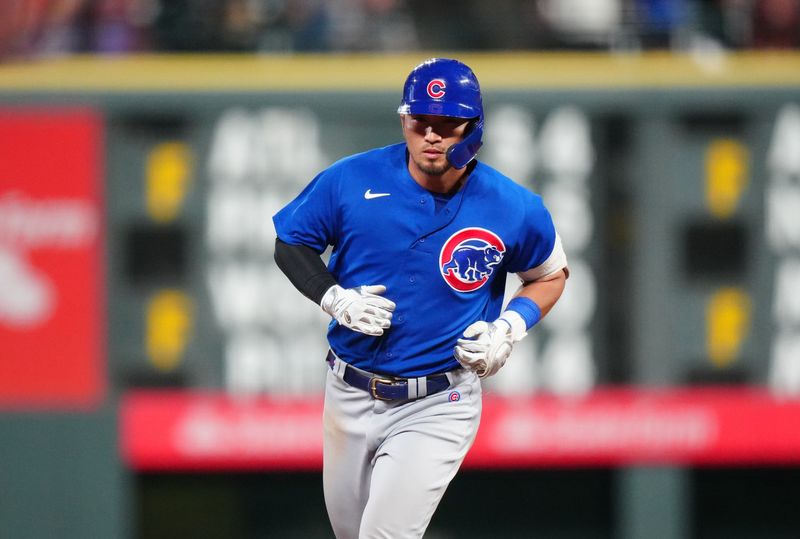 Sep 12, 2023; Denver, Colorado, USA; Chicago Cubs right fielder Seiya Suzuki (27) runs off a two run home run in the sixth inning against the Colorado Rockies at Coors Field. Mandatory Credit: Ron Chenoy-USA TODAY Sports