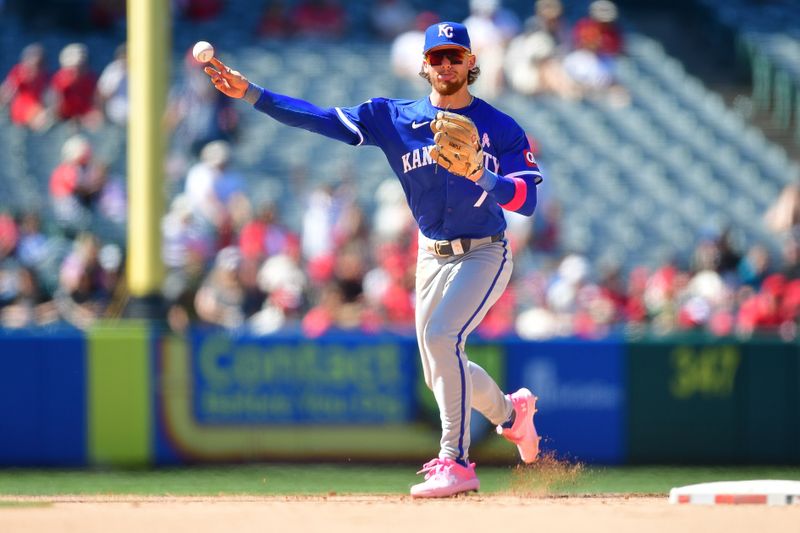 May 12, 2024; Anaheim, California, USA; Kansas City Royals shortstop Bobby Witt Jr. (7) throws to first for the out against Los Angeles Angels first baseman Nolan Schanuel (18) during the ninth inning at Angel Stadium. Mandatory Credit: Gary A. Vasquez-USA TODAY Sports