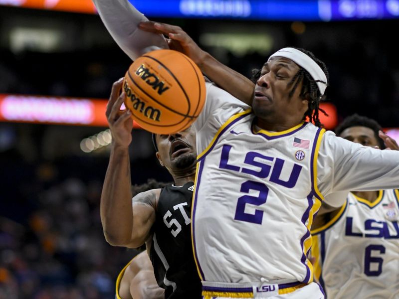 Mar 14, 2024; Nashville, TN, USA;  LSU Tigers guard Mike Williams III (2) blocks the shot of \Mississippi State Bulldogs guard Dashawn Davis (10) during the first half at Bridgestone Arena. Mandatory Credit: Steve Roberts-USA TODAY Sports